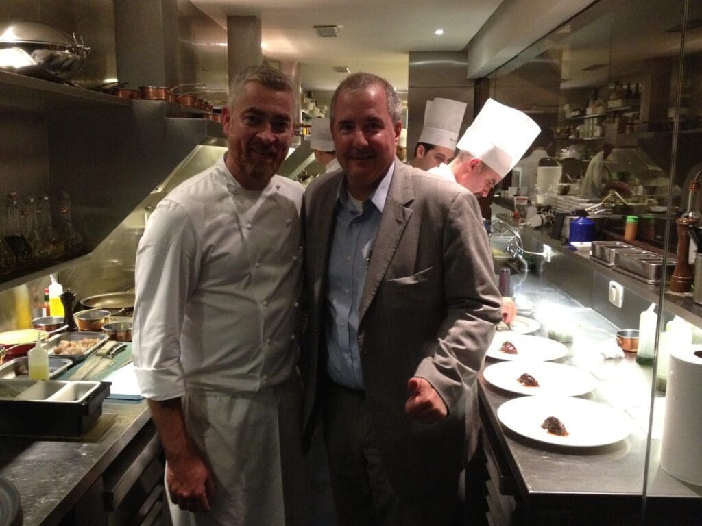 Chef in the kitchen with gentle man
